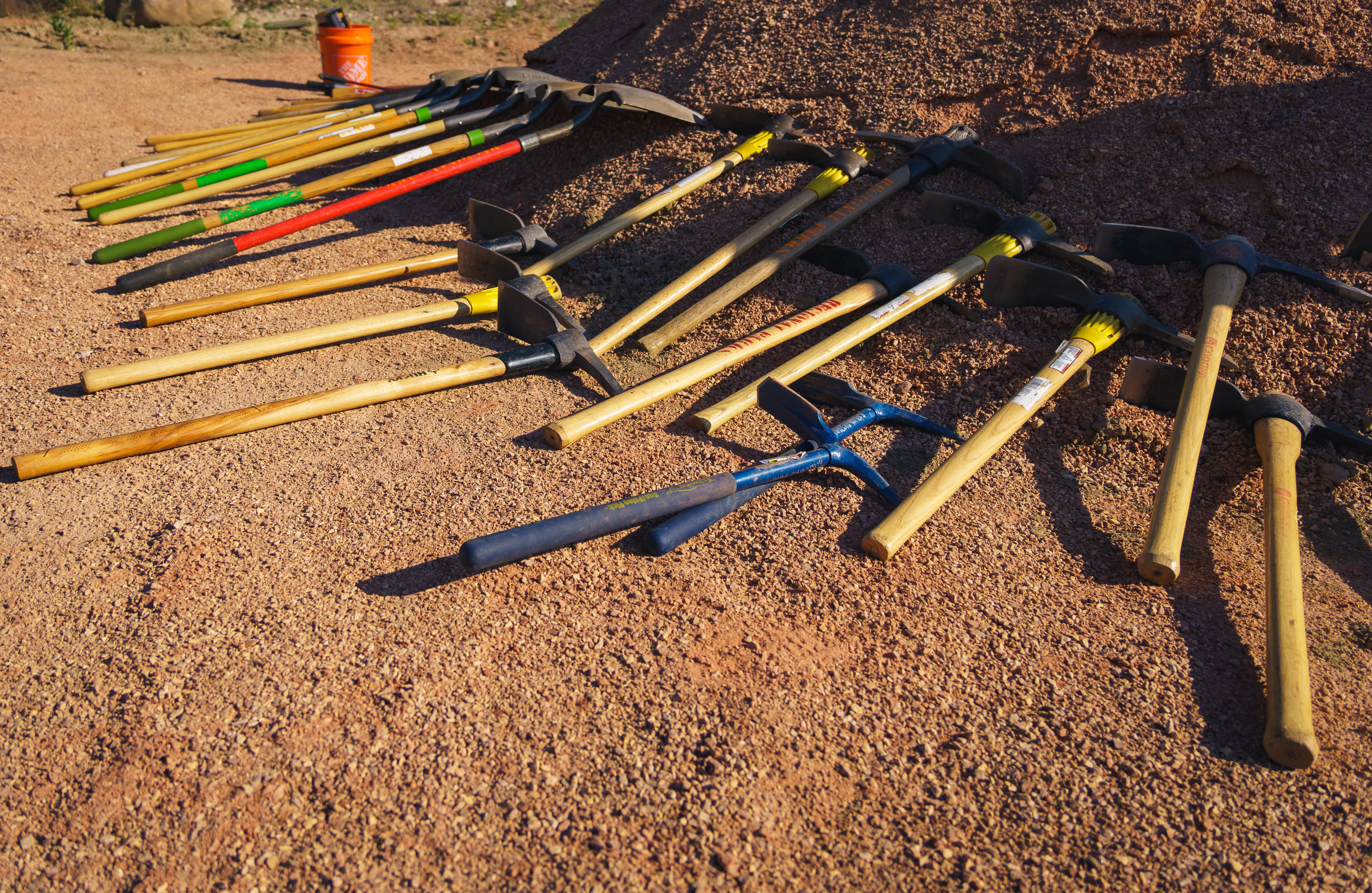 Volunteer trail tools laid out before a workday begins